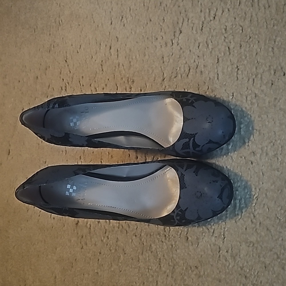Vince Camuto pumps with gray flowers.